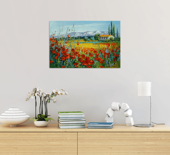 Poppy field near the mountains