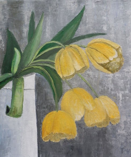 Still life with yellow tulips