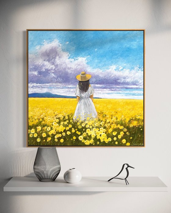 Summer. Woman in flower field