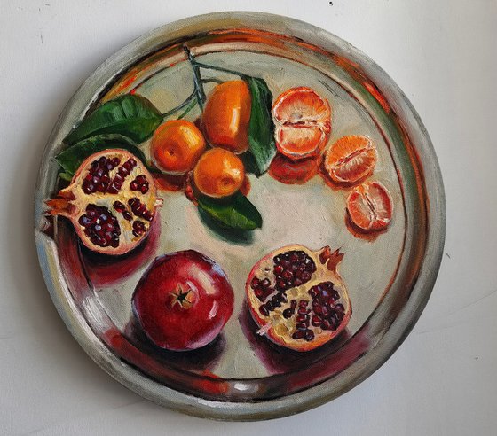 Pomegranates and tangerines