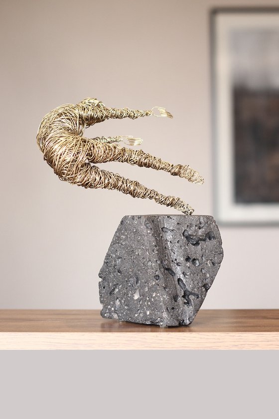 Storm (23x19x14cm 2.1kg brass, tufa)