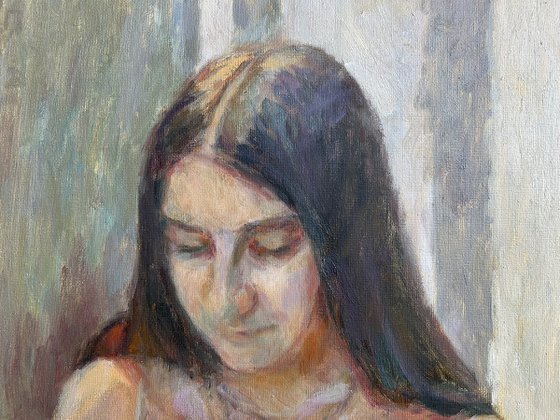 A girl reading a letter