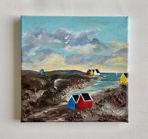 Beach Huts in a Cove