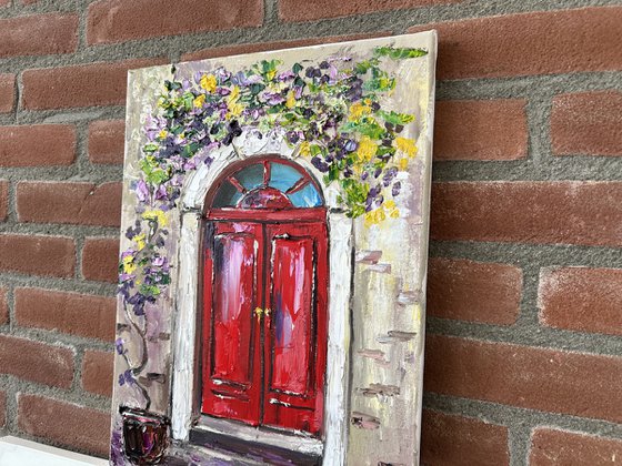 Red door with flowers