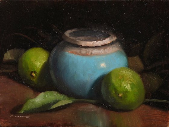 Limes and a Blue Pot