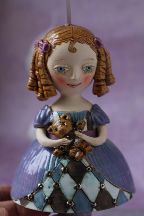 Girl with a teddy bear. Hanging sculpture  by Elya Yalonetski