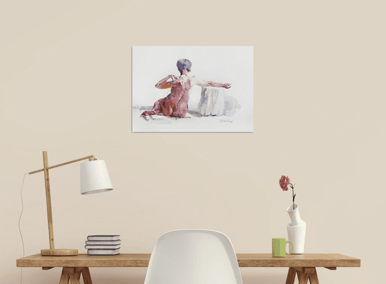 sitting nude
