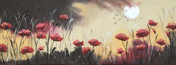 Bright red poppies by the full moon