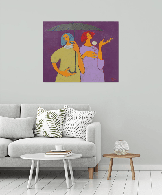 Two under an umbrella.