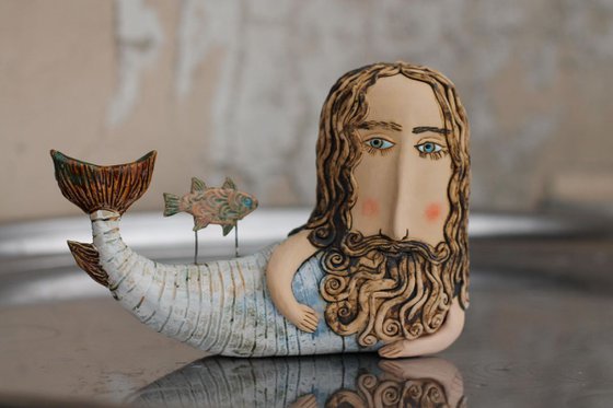 Merman, the sea leon. Ceramic ooak sculpture.