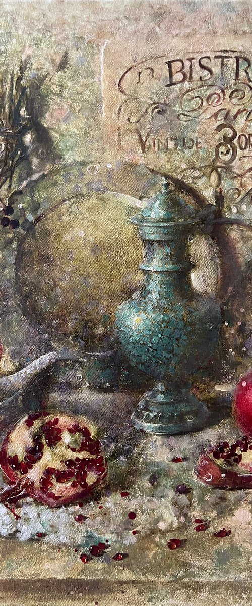 Pomegranate in French bistro by Yulia Odukalets