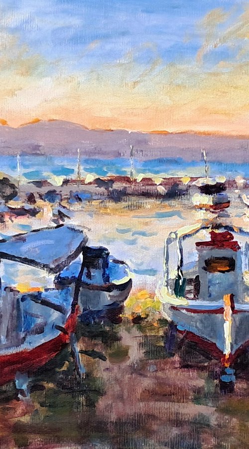 Boats in the sunset. by Dimitris Voyiazoglou