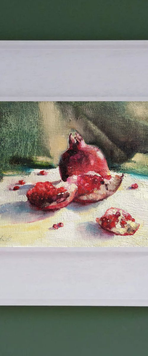 Red pomegranate seeds by Olha Laptieva