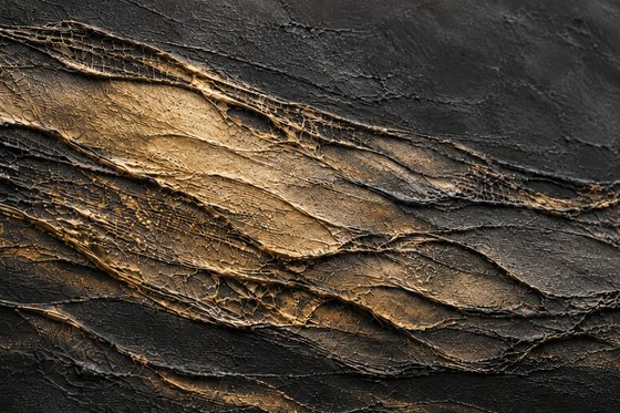 Gold Reflections on Textured Black Waves