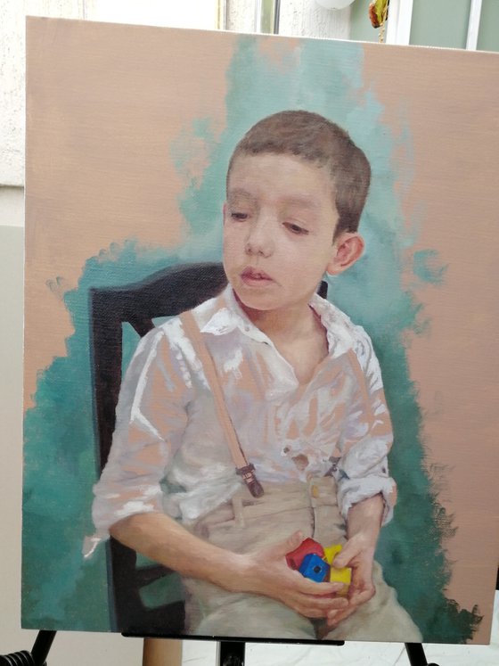 Boy with wooden cubes