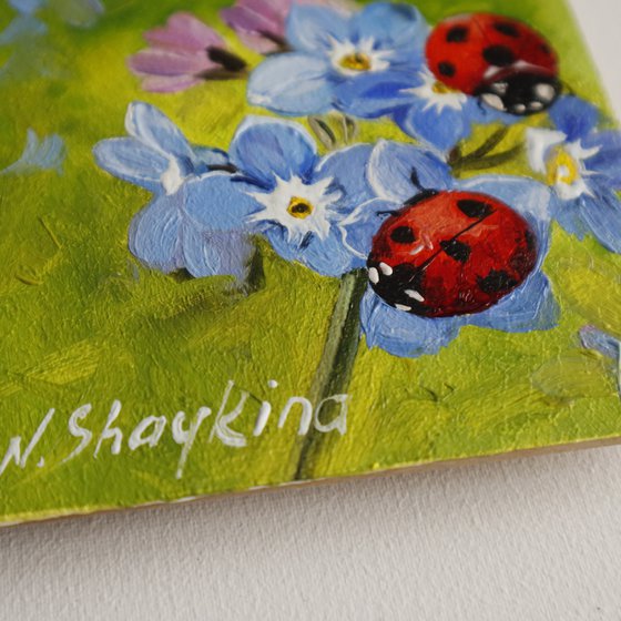 Ladybugs and Blue Flowers