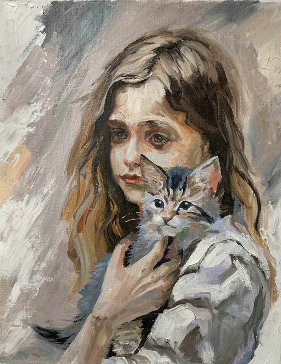 Girl with Maine Coon kitten