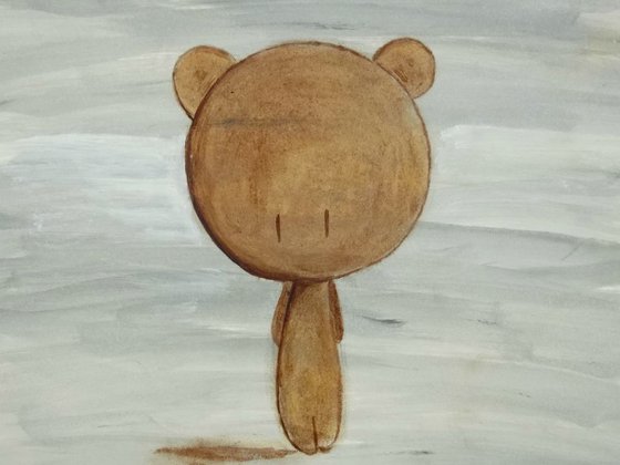 brown teddy bear on grey background