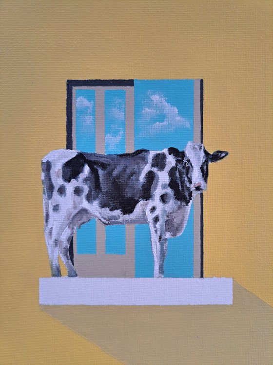 Cow on a Ledge