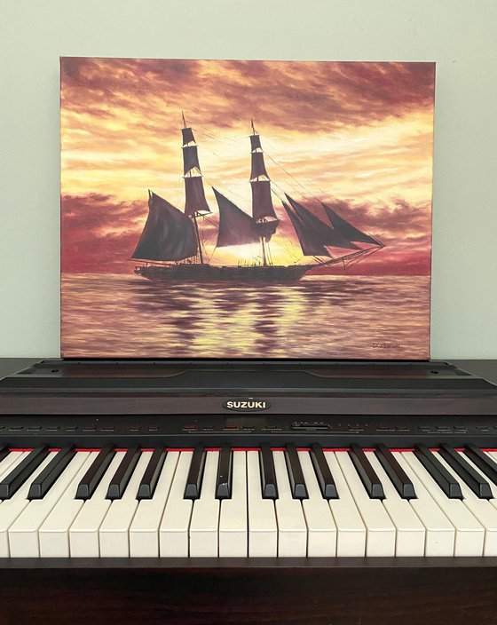 Sails in the orange sunset