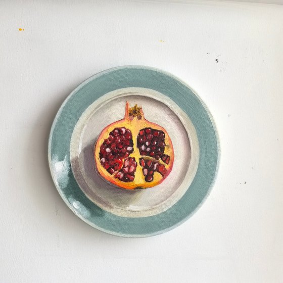 Pomegranate on plate