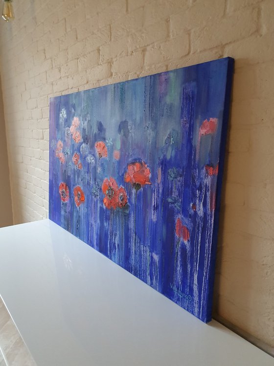 Poppies on blue