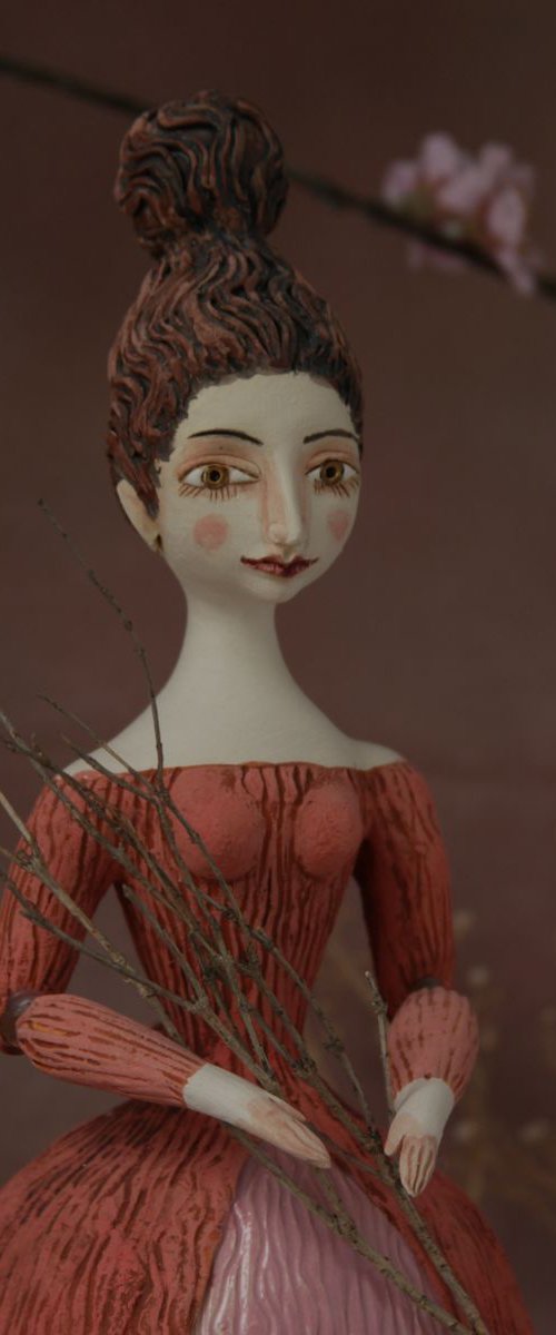 Beautiful Dame with Twirled Updo in Red & White Dress.  Wall sculpture by Elya Yalonetski by Elya Yalonetski