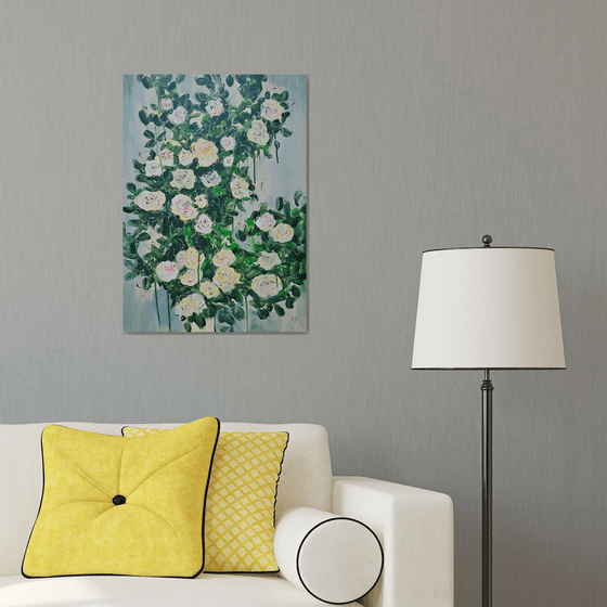 Blooming abstract rose garden in pale yellow