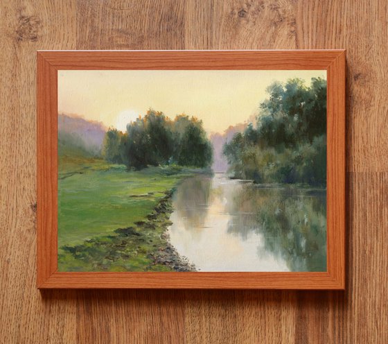 Cloudy sunrise on the river