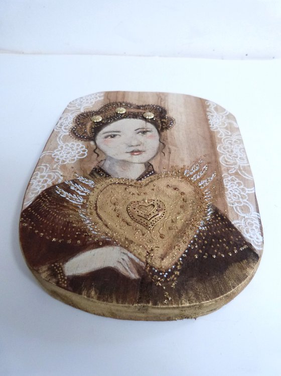 Portrait on wood, woman with a sacred heart. Sacred flight.