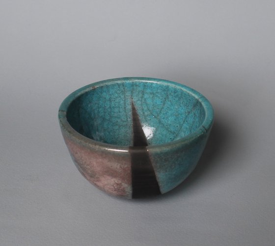 Raku Bowl with a smoked black stripe.