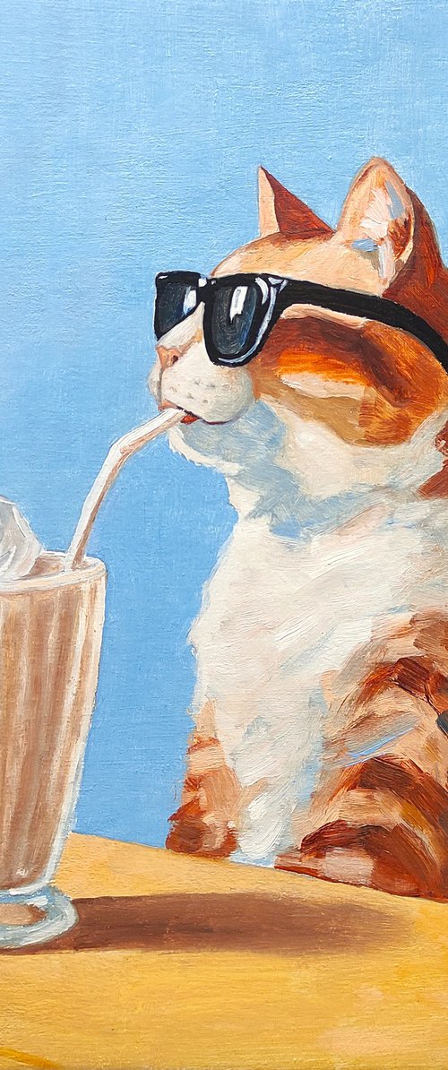 Cat drinking a milkshake by Yulia Berseneva