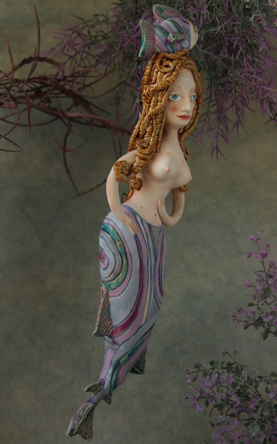 Mermaid with a fish,  Wall sculpture by Elya Yalonetski.