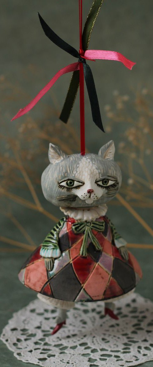 Little pussycat in harlequin dress. Hanging sculpture, bell doll by Elya Yalonetski by Elya Yalonetski