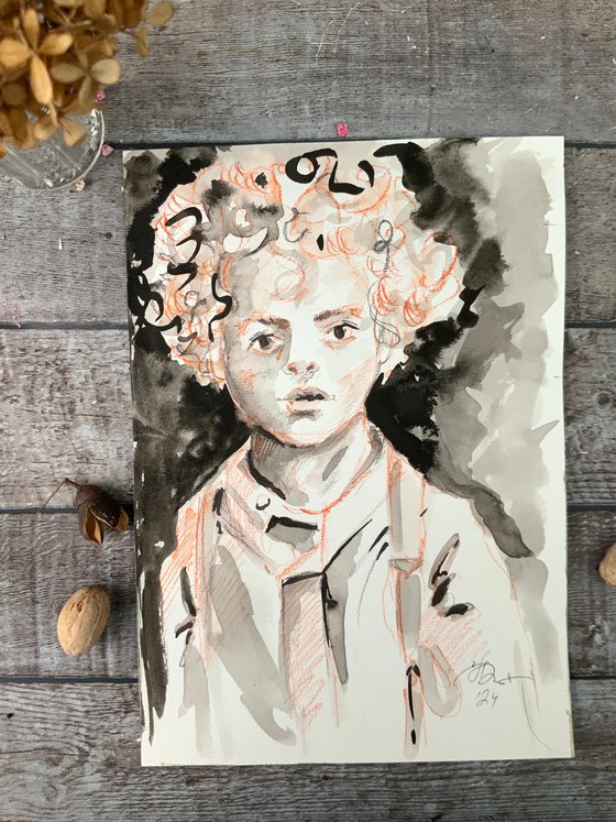 Portrait of a curly-haired boy