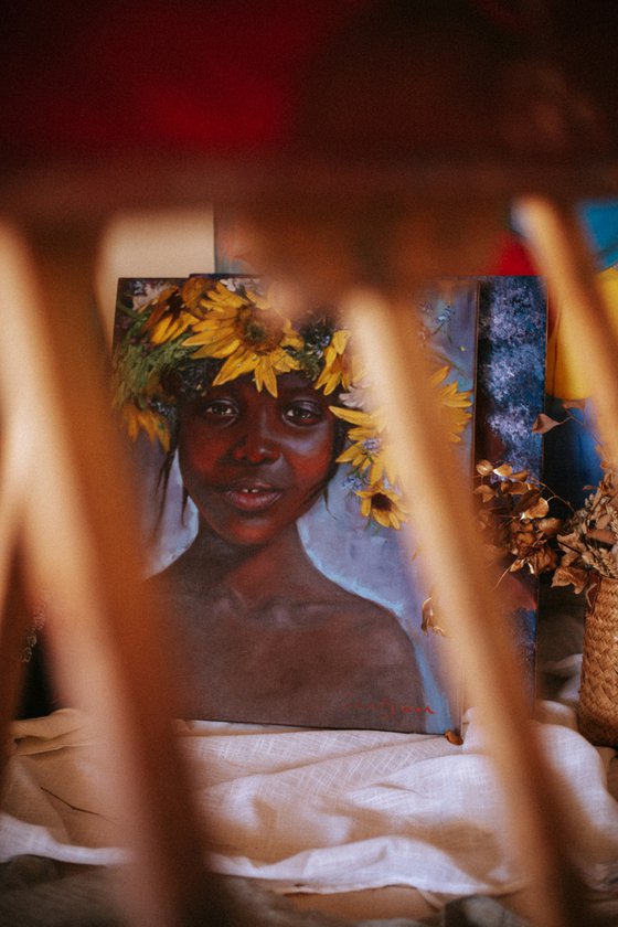 African american girl with flowers portrait