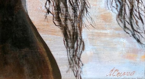 Naked woman by the river