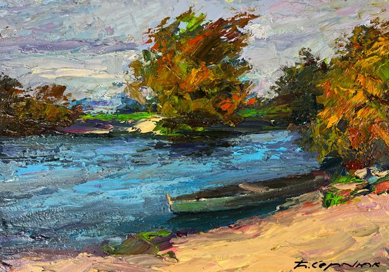 A Boat on the River Bank
