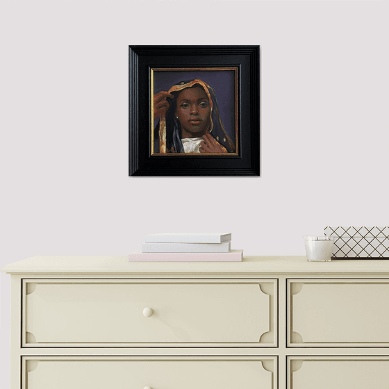 Young Black Woman oil portrait with frame.