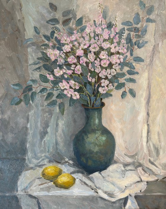 Still life with green vase and lemons