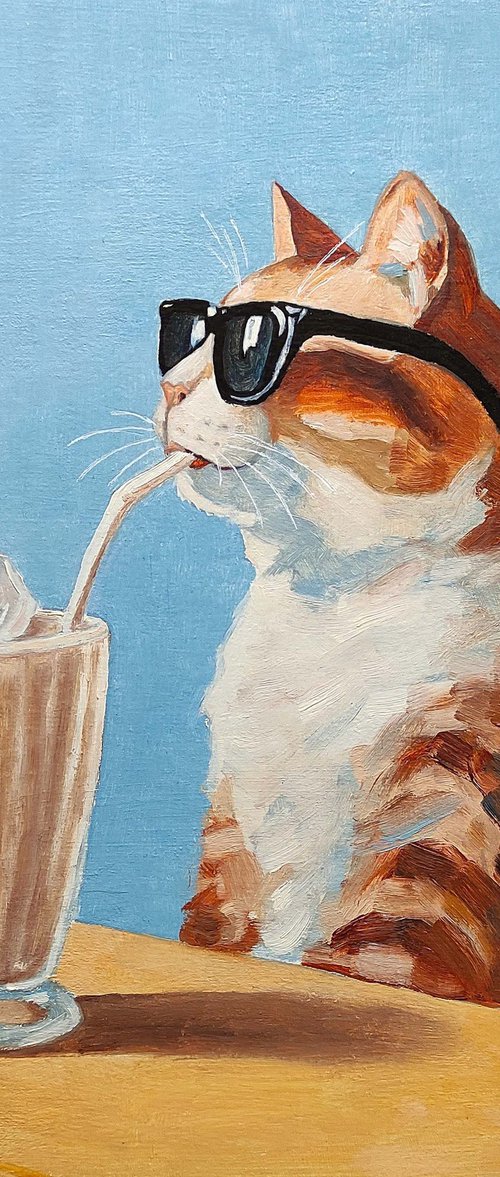 Cat drinking a milkshake by Yulia Berseneva