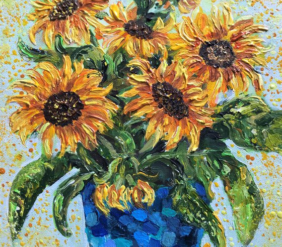 Yellow Sunflowers in a Blue Vase