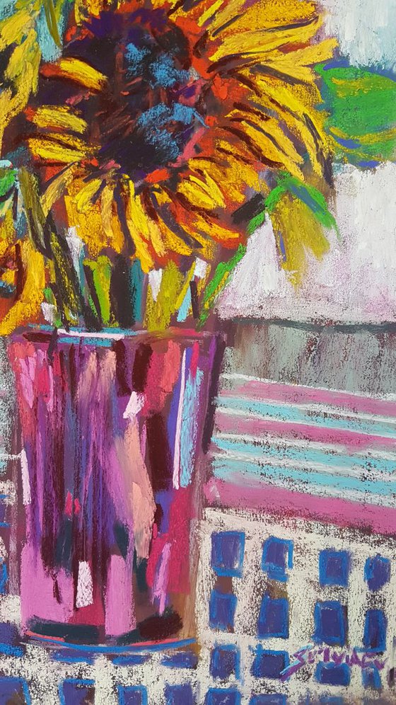 Sunflowers in a pink vase