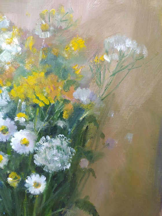 Chamomile and tansy in a vase