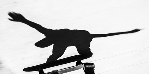 SKATEBOARDER IN SILHOUETTE by Andrew Lever
