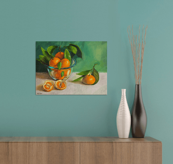 Tangerines in glass bowl
