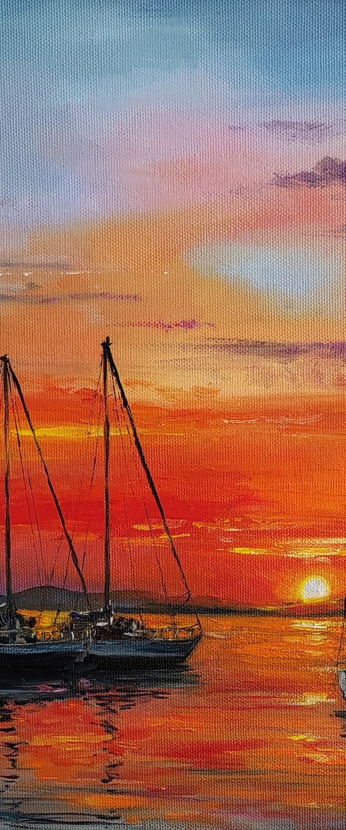 Sailing boats at sunset by Leyla Demir