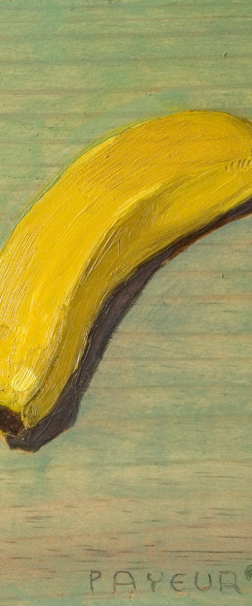 banana on a wood board for food lovers by Olivier Payeur