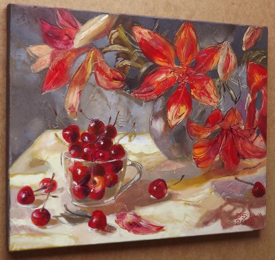 Cup with sweet cherries