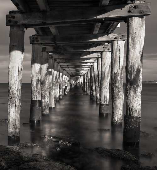 Tranquil Pier by Nick Psomiadis